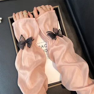 Manches de protection solaire rose femme avec nœud papillon noir, accessoires d'été respirants.