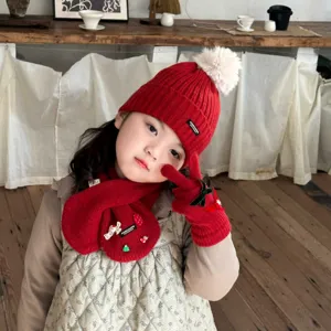 Children winter warm knit hat scarf gloves set detail view, soft cozy red woolen kids accessories.