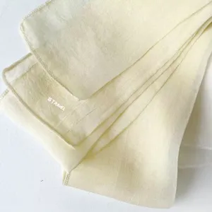 Silk scarf detail close up light yellow ribbon hair accessory thin stylish elegant aesthetic