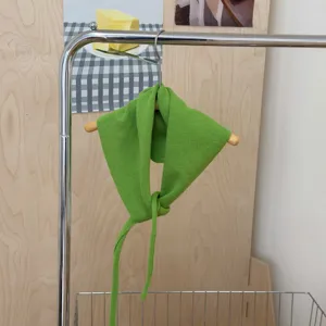 Green knitted triangular scarf with ties, stylish solid color neck warmer shawl for women and kids.