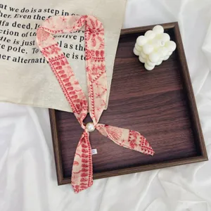 Retro floral skinny scarf with pearl detail, elegant decorative neckerchief for women.