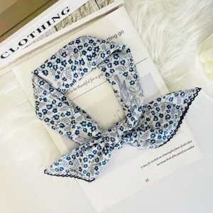 Blue and white floral print square scarf, delicate neckerchief and stylish fashion accessory.