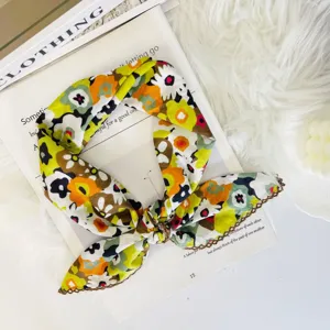 Detailed view of a retro floral square scarf with delicate lace edge, soft and breathable.
