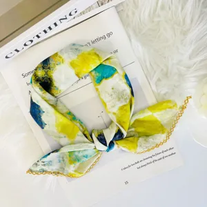 Elegant floral print small square silk scarf with delicate lace edge for stylish wear.