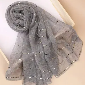 Silver metallic sequin pleated hijab scarf for women, elegant glitter long wrap for autumn.