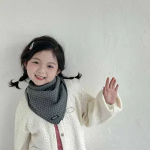 Detailed view of cute toddler polka dot scarf, soft cotton triangle bib for autumn and winter.
