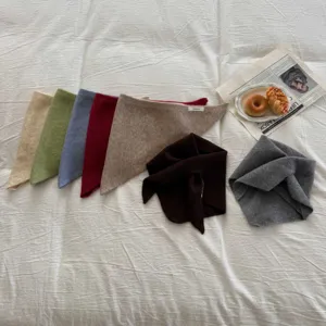 Kids woolen triangular scarf detail shot showing multi-color soft warm neck wrap for winter.