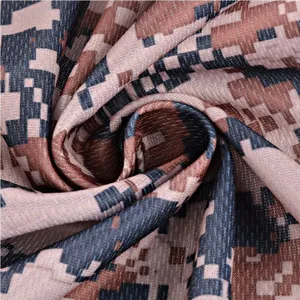 Detailed view of the digital camo sports cooling towel fabric texture, sweat absorbent.