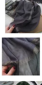 Elegant dark grey silk scarf with shimmering gold glitter edges, lightweight shawl for women.