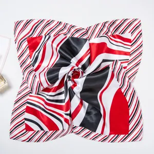 Detail shot of 60cm women silk scarf, classic red black white striped professional neckwear.