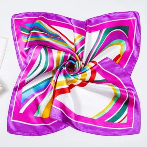 Elegant geometric print square silk scarf for women, colorful striped design for daily wear.