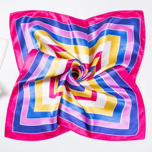 Silk square scarf with vibrant geometric striped design, premium glossy texture for women.