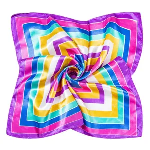 Vibrant geometric square silk scarf with colorful swirl pattern, smooth satin texture for women.