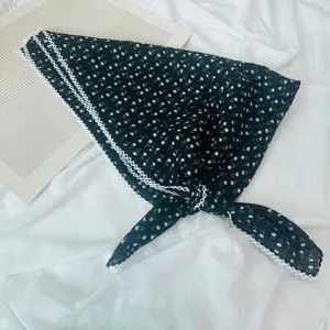 Black floral print triangular headscarf with delicate white lace trim, retro kerchief.