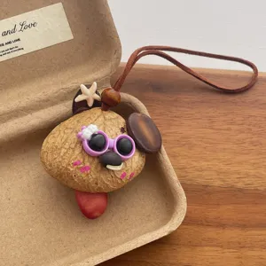 Pendentif mignon fait main en cosse de graine, porte-clés, breloque de sac originale et unique.