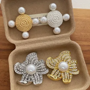 Vintage retro style metal pearl and rhinestone brooch set, exquisite flower and geometric design.