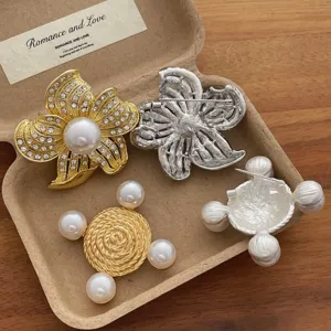 Vintage rhinestone flower and pearl brooch set, retro design suit pin accessory for women.