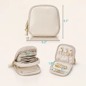 Boîte à bijoux de voyage compacte et organisateur de rangement avec multiples compartiments.