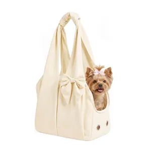 Stylish beige pet carrier tote bag for small dogs, lightweight soft puppy handbag travel bag.