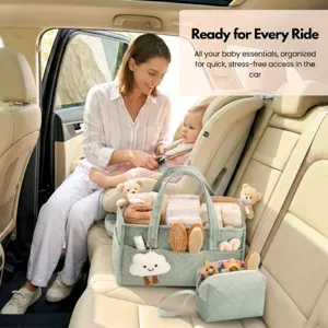 Large capacity quilted diaper caddy bag with portable storage pouch and cute cloud pendant.