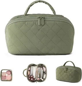 Gesteppte Kosmetiktasche mit grossem Fassungsvermögen, Griff und vielen praktischen Fächern.