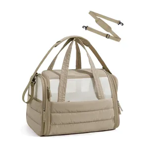 Portable breathable pet carrier bag, collapsible cat dog handbag for outdoor travel.