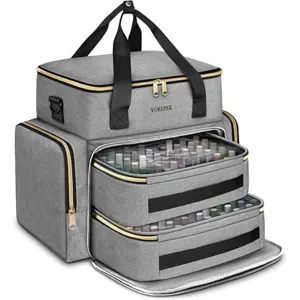 Large capacity nail polish organizer bag detail view with transparent drawers and gold zippers.