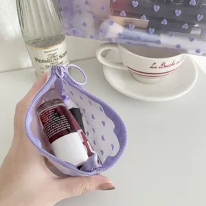 Purple heart flocked mesh cosmetic bag portable zipper storage pouch for travel daily use.