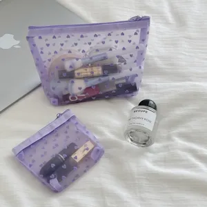Purple heart mesh cosmetic bag, portable transparent makeup organizer for travel and daily use.