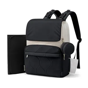 Sac à dos à langer multifonctionnel avec matelas à langer et pochette pour sucette.