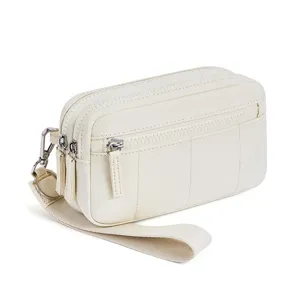 Solid color multi-zipper wrist bag, stylish phone pouch with strap and clasp hook.