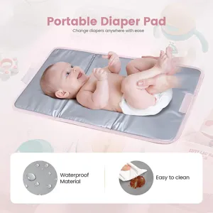 Cambiador de pañales portátil e impermeable para bebés durante viajes, superficie fácil de limpiar.