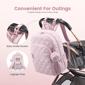 Mochila para pañales acolchada rosa con ganchos para carrito y correa de maleta útil.