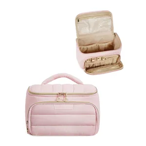 Pink puffer cosmetic bag with large capacity, wide opening and portable handle design.
