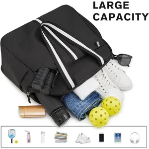 Large capacity sports bag for tennis and pickleball with multiple storage compartments.