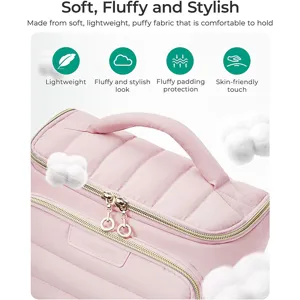 Detailed view of the soft pink puffer cosmetic bag, lightweight and fluffy travel pouch.