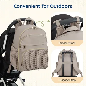 Multifunctional quilted diaper backpack with stroller and luggage straps for travel.