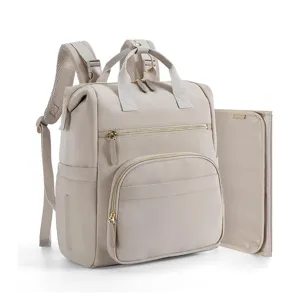 Waterproof diaper backpack detail showcasing golden zippers, spacious compartments and changing pad.