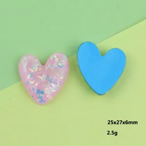 Pink and blue heart resin cabochons detail shot, perfect for DIY phone case and accessories.