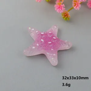 Close-up detail of the charming pink gradient resin starfish DIY accessory and shoe charm.