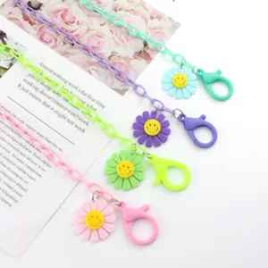 Colorful acrylic daisy flower chain strap with smiley pendant and lobster clasp for mask.