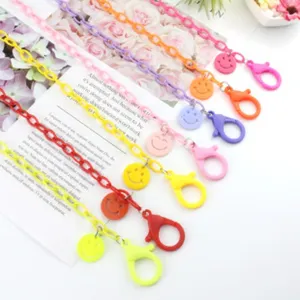 Colorful acrylic face mask chain set with cute smiley face pendants for everyday use