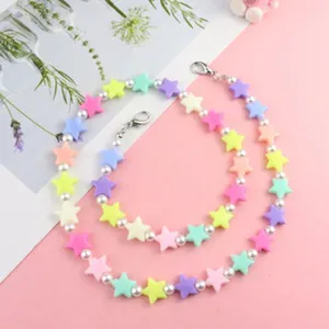 Pastel star beaded mask chain and necklace set featuring colorful acrylic stars and pearls.
