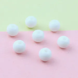 White acrylic round beads, smooth surface with center hole for DIY jewelry making details.