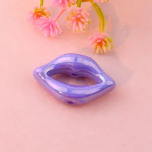 Purple acrylic lip shaped loose bead for DIY jewelry making, smooth surface straight hole accessory.