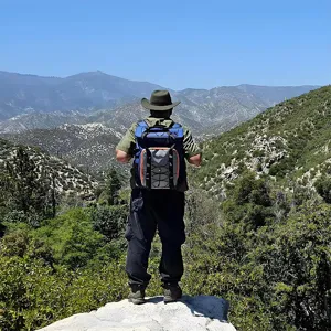 Insulated picnic backpack with large capacity for outdoor travel camping and hiking activities.