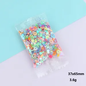 Close-up detail of colorful iridescent sequin fillers for DIY crafts, slime and nail art.