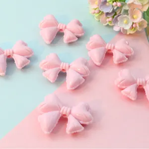 Macaron pink large acrylic bow loose beads closeup detail for DIY phone chain jewelry making