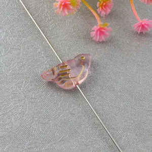 Pink acrylic bird loose bead with gold lines for DIY jewelry, necklace bracelet crafting.