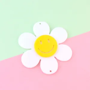Acrylic smiley face flower pendant accessory, double layer white petal yellow center cute DIY charm.